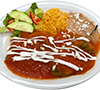 A stuffed chile relleno served  with rice, beans,& tortillas.